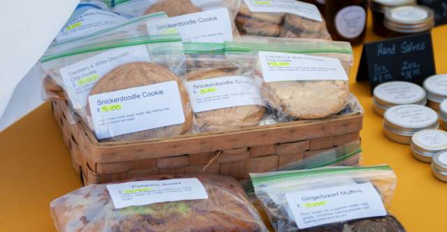 Cookies and breads being sold at the farmer's market.