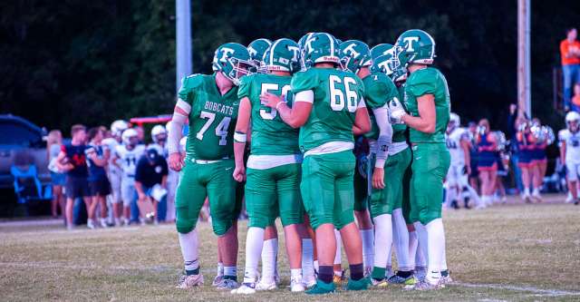 THAYER, MO – SEPTEMBER 6: Thayer Bobcats team groups together before the play during the high school football game between the Thayer Bobcats and the Lighthouse Christian Chargers on September 6, 2024, at the Thayer High School football field in Thayer, MO. (Photo by Amanda Thomas/AltonMo.com