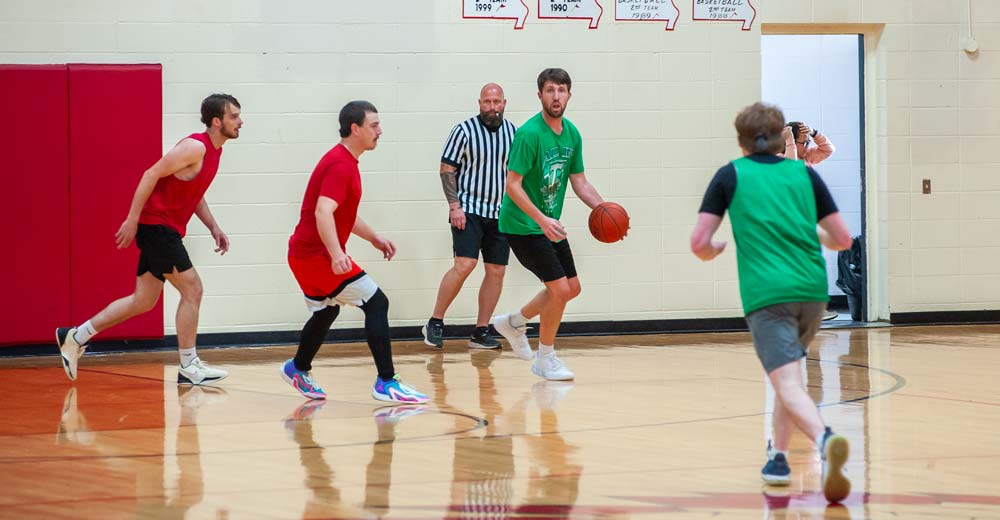 COUCH, MO - MARCH 29: A Thayer player looks to dribble down the court during the basketball game between the Thayer alumni and the Couch alumni on March 29, 2025 at the Couch High School Gym in Couch, Missouri. (Photo by Amanda Thomas/AltonMo.com)