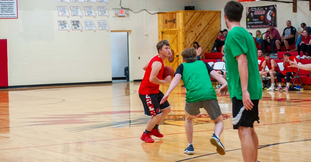 COUCH, MO - MARCH 29: A Couch player looks to go to the basket and make a shot during the basketball game between the Thayer alumni and the Couch alumni on March 29, 2025 at the Couch High School Gym in Couch, Missouri. (Photo by Amanda Thomas/AltonMo.com)