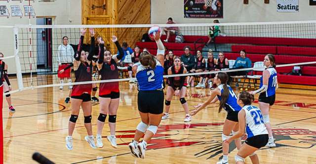 COUCH, MO – SEPTEMBER 8: Koshkonong Blue Jays player spikes the ball over the net during the high school volleyball game between the Couch Indians and the Koshkonong Blue Jays on September 8, 2025, at the Couch High School Gym in Couch, Missouri. (Photo by Amanda Thomas/AltonMo.com)