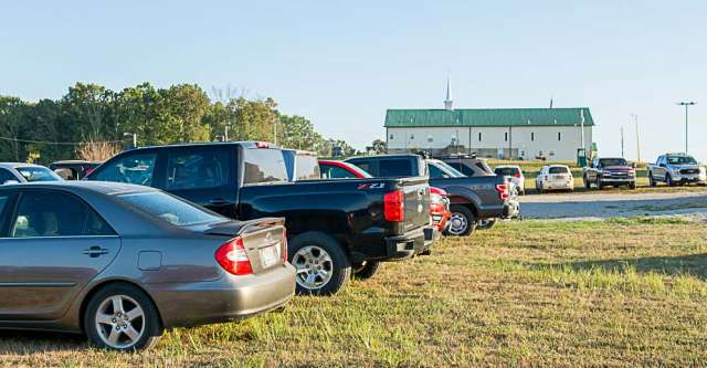 Rows of cars filled up parking at Rover Volunteer Fire Department's BBQ.