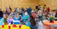 The Country Meadows Christian Venue/Event Center full of people at Rover VFD's BBQ and auction.