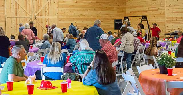 The Country Meadows Christian Venue/Event Center full of people at Rover VFD's BBQ and auction.