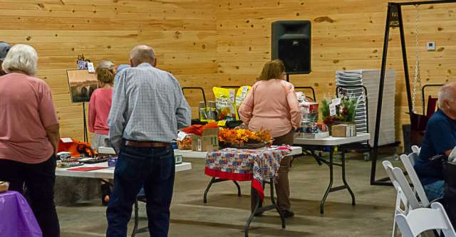 A variety of different items waiting to be auctioned off.