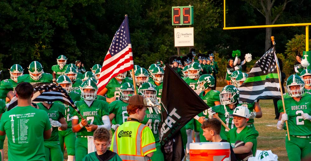 THAYER, MO – SEPTEMBER 12: Thayer Bobcats team runs onto the field before the high school football game between the Thayer Bobcats and the Liberty (Mtn. View) Eagles on September 12, 2025, at the Thayer High School football field in Thayer, MO. (Photo by Curtis Thomas/AltonMo.com)
