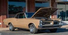 A gold car at the classic car cruise-in on Friday.