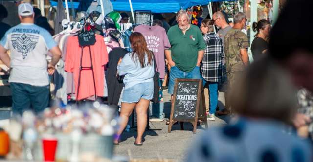 T-shirts and hats being sold at Thayer's Fall Festival.
