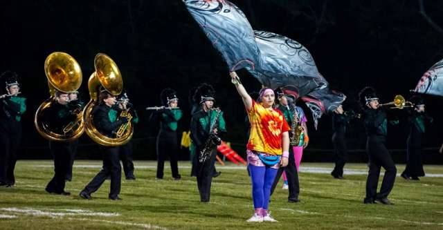 THAYER, MO – OCTOBER 17: The Thayer Bobcats marching band flag girls perform at halftime during the high school football game between the Thayer Bobcats and the Willow Springs Bears on October 17, 2025, at the Thayer High School football field in Thayer, MO. (Photo by Curtis Thomas/AltonMo.com)