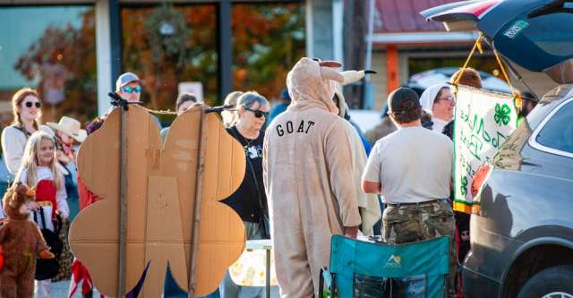 The 4-H group handing out candy.
