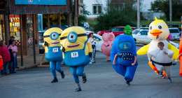 Kids 17 and under participating in the inflatable costume race.