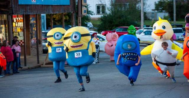 Kids 17 and under participating in the inflatable costume race.