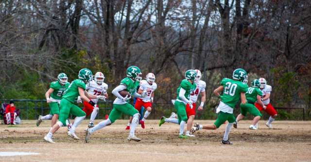 THAYER, MO – NOVEMBER 22: Thayer Bobcats wide receiver Cordell Washington (1) runs down the field through the opening his teammates make for him during the high school football game between the Thayer Bobcats and the Tipton Cardinals on November 22, 2025, at the Thayer High School football field in Thayer, MO. (Photo by Curtis Thomas/AltonMo.com)