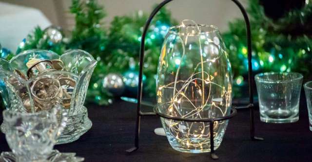 A vase filled with fairy lights.