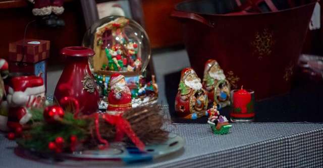 Little Santa figurines on a table.