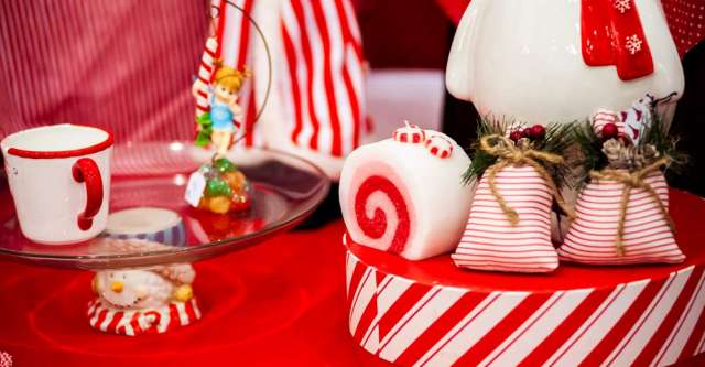 Christmas items sitting on a table.
