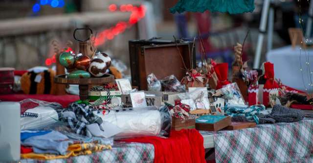 A vendor selling various Christmas items.