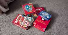 Board games in a pile.