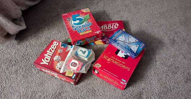 Board games in a pile.