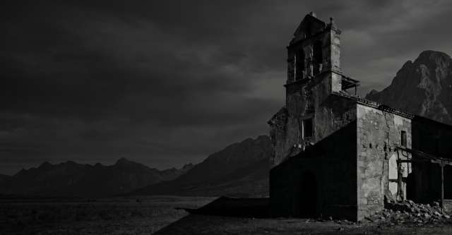 Abandoned old church in desert.
