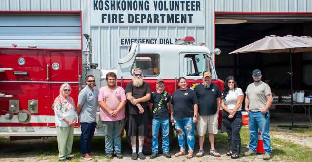 Individuals pose for a photo at Koshkonong VFD's grant celebration.