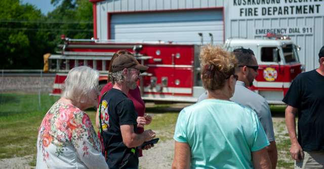 People talking at koshkonong's grant celebration.