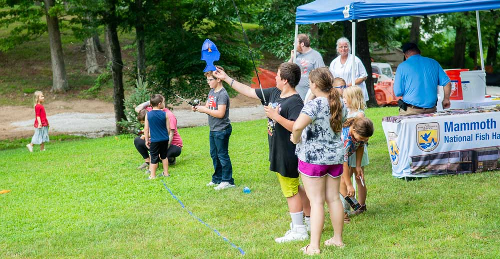 Kids "fishing" at Mammoth Spring's Independence Day celebration.