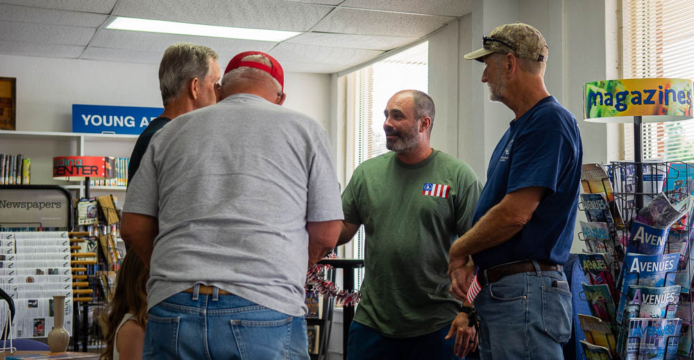 David Manrrique talking to attendees at the Flag talk.