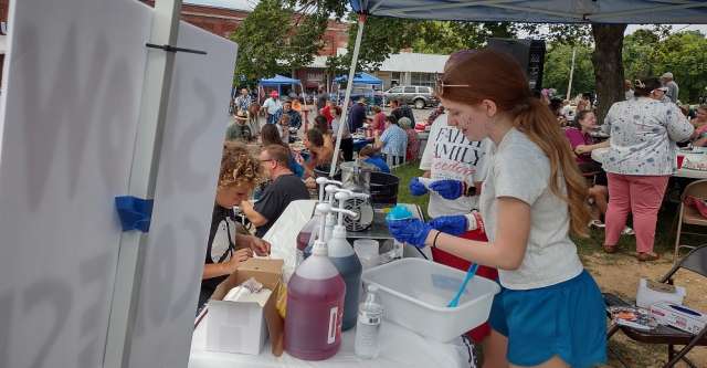 Serving Sno-cones at the America's 250 Potluck Celebration in Alton, MO.