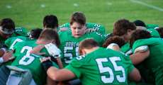 THAYER, MO – SEPTEMBER 18: Thayer Bobcats team prays before the high school football game between the Thayer Bobcats and the Salem Tigers on September 18, 2026, at the Thayer High School football field in Thayer, MO. (Photo by Curtis Thomas/AltonMo.com)