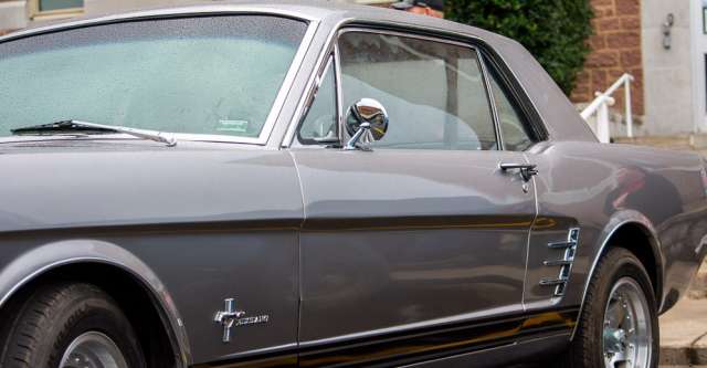 A sleek silver Ford participating in the cruise-in.
