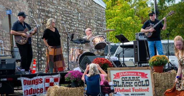 Sarah Jo Sample & the Tonedaddys performing at the Walnut Festival.