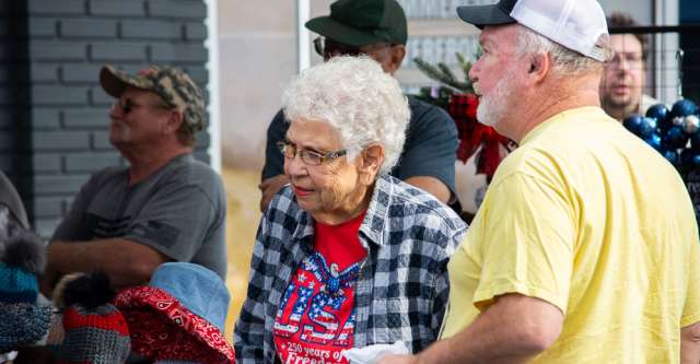 A lady talking at the Walnut Festival.